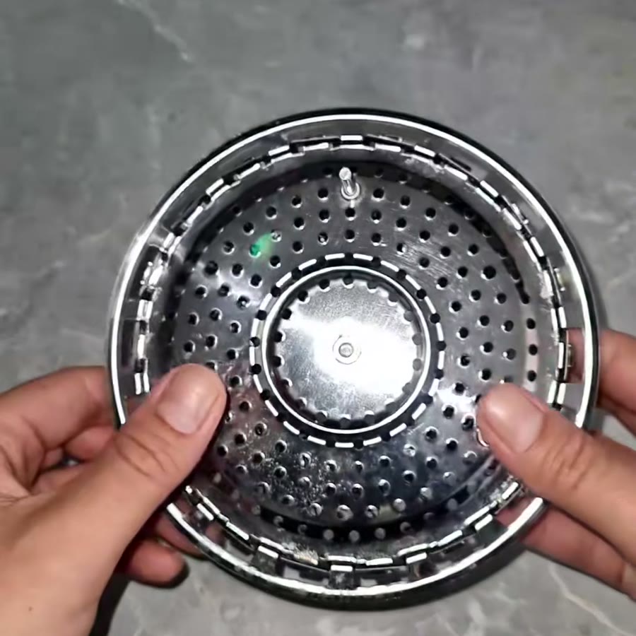 Vaporera plegada en la mano
